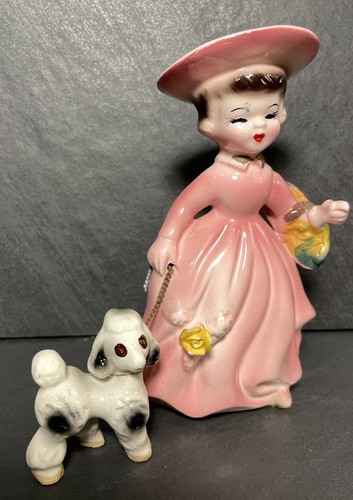 Figurine woman walking her dog - figurine,