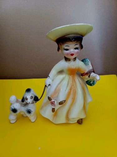 Figurine woman walking her dog - woman,